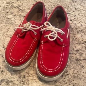 Red Nautica boat shoes.